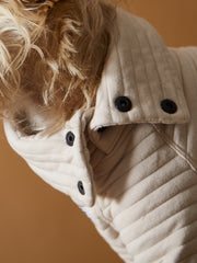 Quilted sweater for dogs with neck buttons